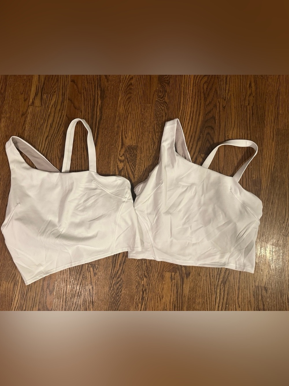 lululemon athletica White Tank Tops $28 each.